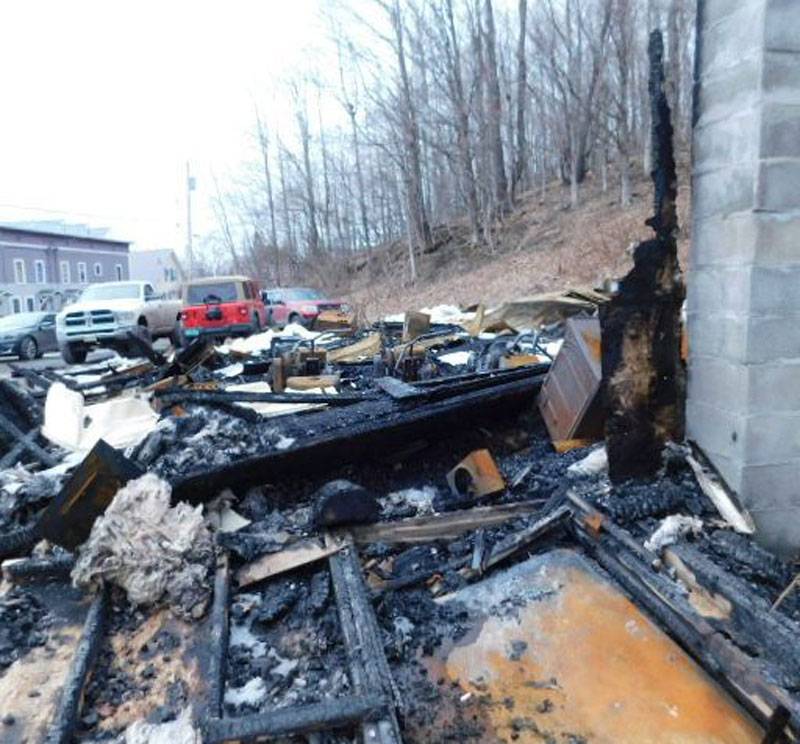 Burnt husk of a garage after a fire